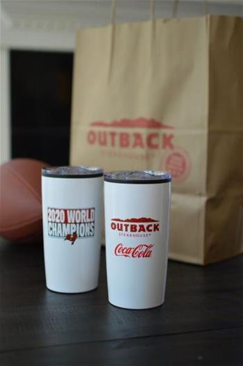 Photo of tumbler with Tampa Bay Bucs, Outback, Coca Cola logos